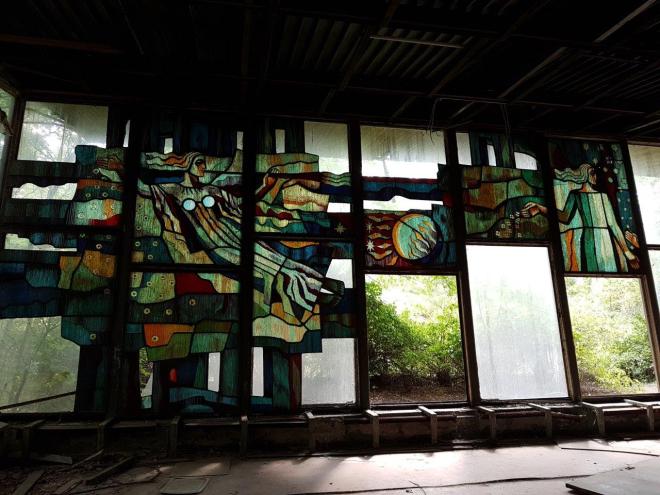 Glass paintings in one of the houses by the river. Pripyat, Chernobyl, Ukraine