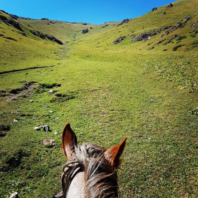 Heading towards WiFi Mountain. Three day horse-riding trip to Song Kul, Kyrgyzstan.